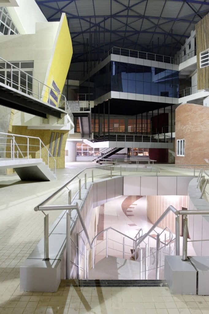 Open atrium with angular walkways and natural light
